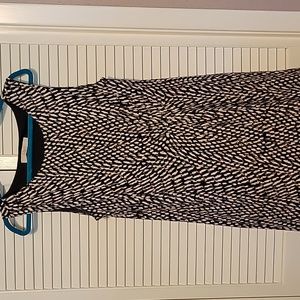 Loft sleeveless lined rayon dress with off center ruching accent.